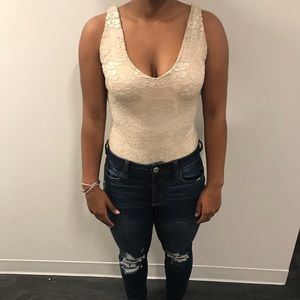 Tan and embroidered body suit